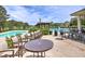 A luxurious community pool area with ample seating and a pergola, perfect for relaxation and social gatherings at 351 Ridgewater Dr, Marietta, GA 30068