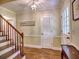 Charming foyer with hardwood floors, a staircase, and classic wall decor, offering an inviting atmosphere at 351 Ridgewater Dr, Marietta, GA 30068