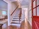 Welcoming foyer with hardwood floors, a staircase, and views into the living room, creating a warm entrance at 351 Ridgewater Dr, Marietta, GA 30068