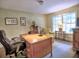 Home office setup featuring a desk, office chair, and a window with natural light at 351 Ridgewater Dr, Marietta, GA 30068