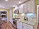 Modern kitchen featuring granite countertops, stainless steel appliances, and classic white cabinets at 351 Ridgewater Dr, Marietta, GA 30068
