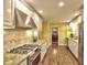 Modern kitchen featuring white cabinets, granite countertops, and stainless steel appliances at 351 Ridgewater Dr, Marietta, GA 30068