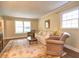Inviting living room featuring a sofa, armchairs, and a patterned rug at 351 Ridgewater Dr, Marietta, GA 30068