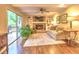Cozy living room featuring a fireplace, built-in shelves, and a sliding door to a deck, great for relaxation at 351 Ridgewater Dr, Marietta, GA 30068