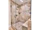 Luxurious shower showcasing tile detail, a sleek glass enclosure, and modern fixtures at 351 Ridgewater Dr, Marietta, GA 30068