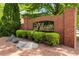 Community entrance with brick sign and landscaping for The Villages at Oakshire at 1196 Erica Se Way, Atlanta, GA 30354