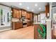 Well-equipped kitchen featuring stainless steel appliances, granite countertops, and custom cabinetry at 135 Haleys Cir, Woodstock, GA 30188
