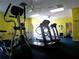 Bright gym featuring modern exercise equipment, ceiling fans, and recessed lighting at 2007 Wingate Way, Atlanta, GA 30350