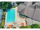 Aerial view of community pool with lounge chairs and umbrellas at 2007 Wingate Way, Atlanta, GA 30350