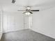 Bright bedroom with ceiling fan and neutral carpeting at 3045 Wyntree Dr, Peachtree Corners, GA 30071