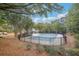 A beautiful community pool surrounded by trees at 3045 Wyntree Dr, Peachtree Corners, GA 30071