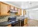 Bright kitchen with mosaic backsplash, granite countertops, and stainless steel appliances at 3045 Wyntree Dr, Peachtree Corners, GA 30071