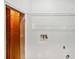 Spacious laundry room with hookups and wire shelving at 3045 Wyntree Dr, Peachtree Corners, GA 30071