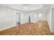Open living room features modern lighting, spacious area, and clean design at 3045 Wyntree Dr, Peachtree Corners, GA 30071
