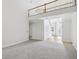Bright living room with gray carpet, two-story ceilings and view of entry at 3045 Wyntree Dr, Peachtree Corners, GA 30071