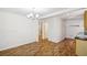 Spacious living space featuring hardwood floors that lead to other rooms and spaces at 3045 Wyntree Dr, Peachtree Corners, GA 30071