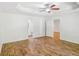 Spacious main bedroom with hardwood floors, trey ceiling and ceiling fan at 3045 Wyntree Dr, Peachtree Corners, GA 30071