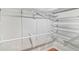 This walk-in closet includes shelving and a hanging rod for maximizing storage space at 3045 Wyntree Dr, Peachtree Corners, GA 30071