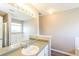 Bright bathroom featuring a spacious vanity, large mirror, and separate shower and tub at 1501 Buckingham Pl, Stockbridge, GA 30281