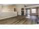 Bright and airy living room with vaulted ceilings and modern hardwood floors at 1501 Buckingham Pl, Stockbridge, GA 30281