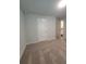 Bright bedroom with carpet and view to bathroom at 558 Fairview Oak Place, Dallas, GA 30157