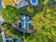 Aerial view of a home with mature trees, pool, and well-manicured lawn at 6 Sentry Rdg, Dallas, GA 30157