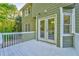 Lovely white wood deck overlooking green backyard at 6 Sentry Rdg, Dallas, GA 30157