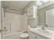 Bathroom including tub with shower, toilet, and sink with cabinet storage space at 6 Sentry Rdg, Dallas, GA 30157