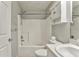 Cozy bathroom including tub with shower, toilet, and sink with cabinet storage space at 6 Sentry Rdg, Dallas, GA 30157