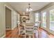 Breakfast nook featuring hardwood floors, round table, and deck access at 6 Sentry Rdg, Dallas, GA 30157