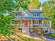 Gorgeous two-story home with a welcoming front porch and well-manicured landscaping at 6 Sentry Rdg, Dallas, GA 30157