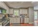 Modern kitchen with stainless steel appliances and granite countertops at 6 Sentry Rdg, Dallas, GA 30157