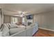Cozy living room featuring a fireplace, hardwood floors, and a comfortable sectional at 6 Sentry Rdg, Dallas, GA 30157