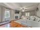 Bright living room features a fireplace, large sectional sofa, and modern television for comfortable Gathering living at 6 Sentry Rdg, Dallas, GA 30157