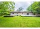 Expansive backyard with a large concrete patio and deck, perfect for outdoor entertaining and relaxation at 110 Valley View Ct, Tyrone, GA 30290