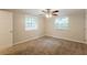 Cozy bedroom with carpet flooring and natural light at 110 Valley View Ct, Tyrone, GA 30290