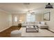 Inviting living room with neutral decor and ample natural light at 110 Valley View Ct, Tyrone, GA 30290