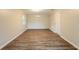 Versatile room featuring updated flooring and natural light at 110 Valley View Ct, Tyrone, GA 30290