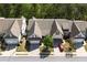 Beautiful neighborhood featuring well-maintained homes with lush green surroundings at 123 Heritage Pointe, Woodstock, GA 30189