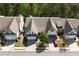 Aerial view of homes, showcasing the neighborhood's layout and landscaping at 123 Heritage Pointe, Woodstock, GA 30189
