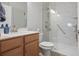 Contemporary bathroom featuring a marble-look shower, a sleek vanity, and modern fixtures at 123 Heritage Pointe, Woodstock, GA 30189