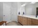 Modern bathroom with dual vanity, ample storage, and neutral tones for a spa-like experience at 123 Heritage Pointe, Woodstock, GA 30189