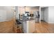 Modern kitchen featuring stainless steel appliances and granite countertops at 123 Heritage Pointe, Woodstock, GA 30189