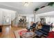 Spacious open-concept living area with hardwood floors and abundant natural light at 123 Heritage Pointe, Woodstock, GA 30189