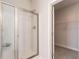 A modern bathroom is equipped with a glass shower and a walk-in closet at 259 Eason St, Bowdon, GA 30108