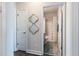 An inviting bathroom features a tiled floor and shower at 259 Eason St, Bowdon, GA 30108