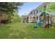 Lush backyard with a swing set and plenty of space for outdoor activities at 2823 Seagrave Way, Marietta, GA 30066