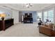 Spacious bedroom with a tray ceiling, TV, fireplace and adjacent exercise area at 2823 Seagrave Way, Marietta, GA 30066