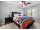 Comfortable bedroom with a ceiling fan, neutral walls, and a bright window with natural light at 2823 Seagrave Way, Marietta, GA 30066