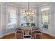 Bright dining area with modern chandelier, hardwood floors, and natural light at 2823 Seagrave Way, Marietta, GA 30066